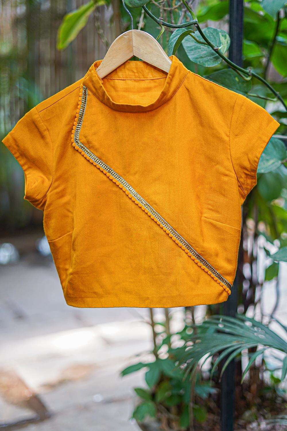 Mustard soft cotton hi neck blouse with gold lace and pom pom detailing - House of Blouse