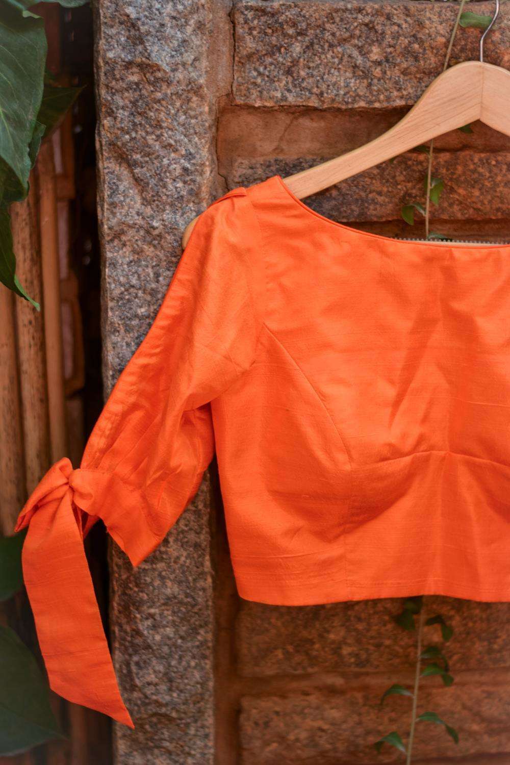 Orange raw silk boat neck blouse with tie up sleeves - House of Blouse