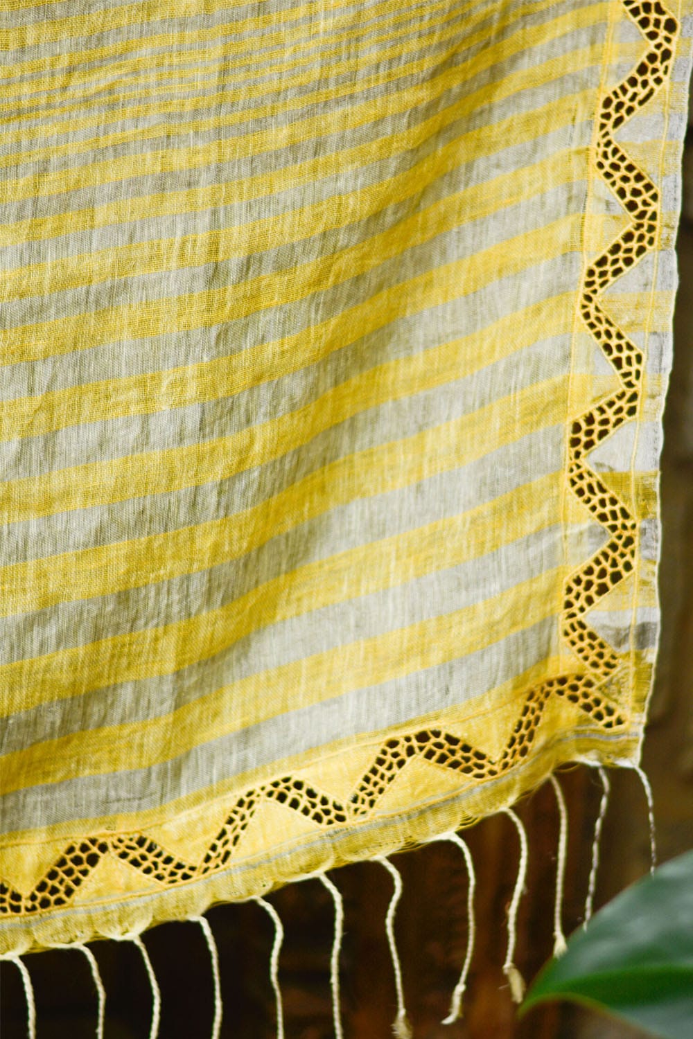 Lemon yellow handwoven linen silver stripes saree with cutwork border and cutwork pallu