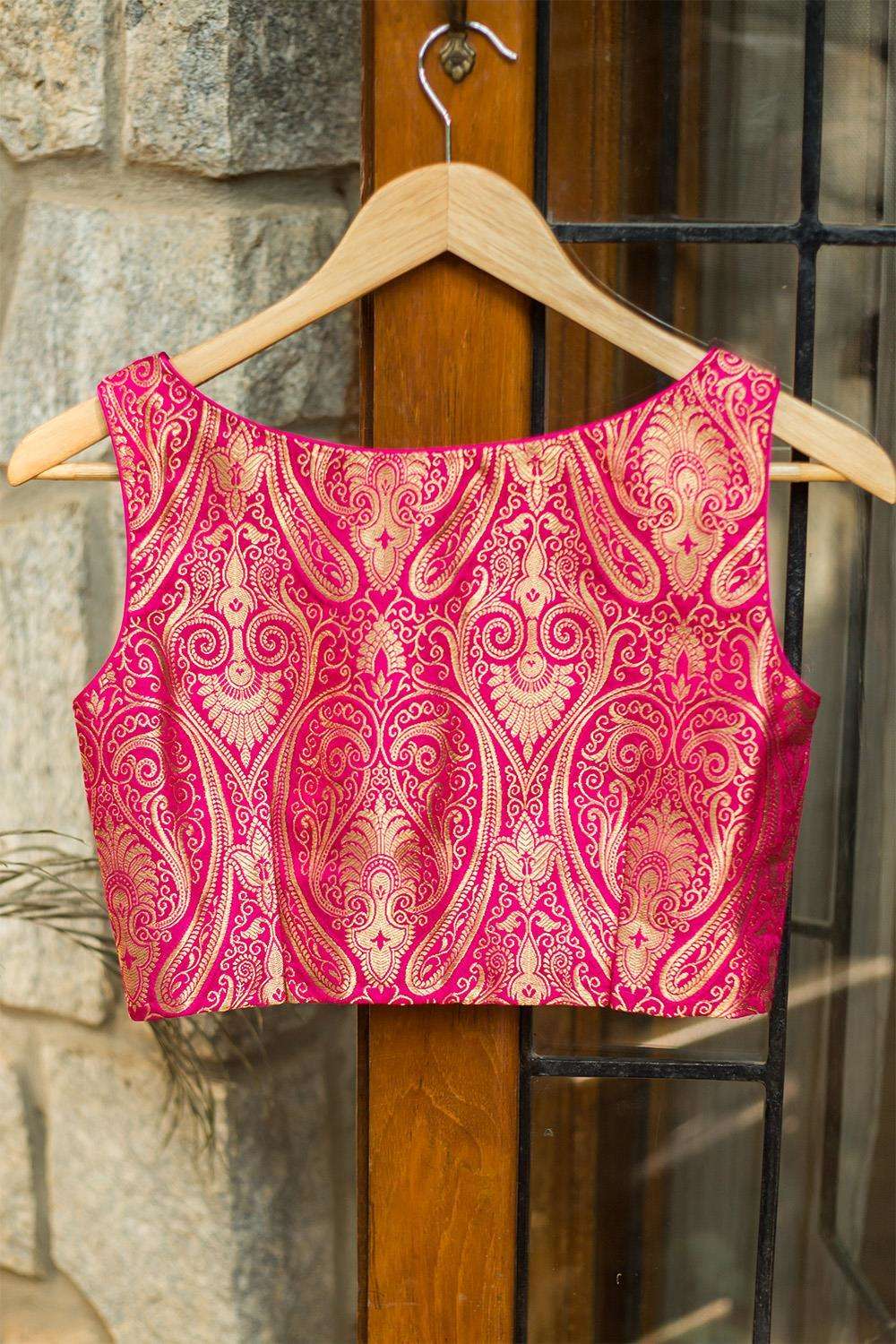 Rani pink brocade sleeveless blouse with potli button detailing - House of Blouse