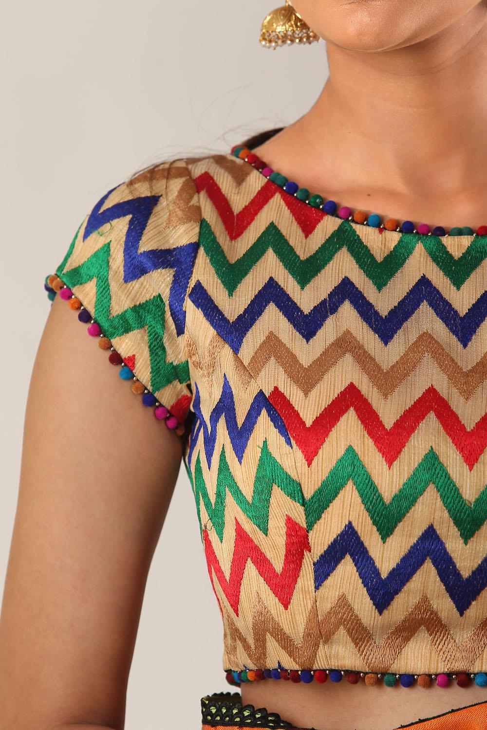Beige and multicolour chevron threadwork boatneck blouse with pom pom edging