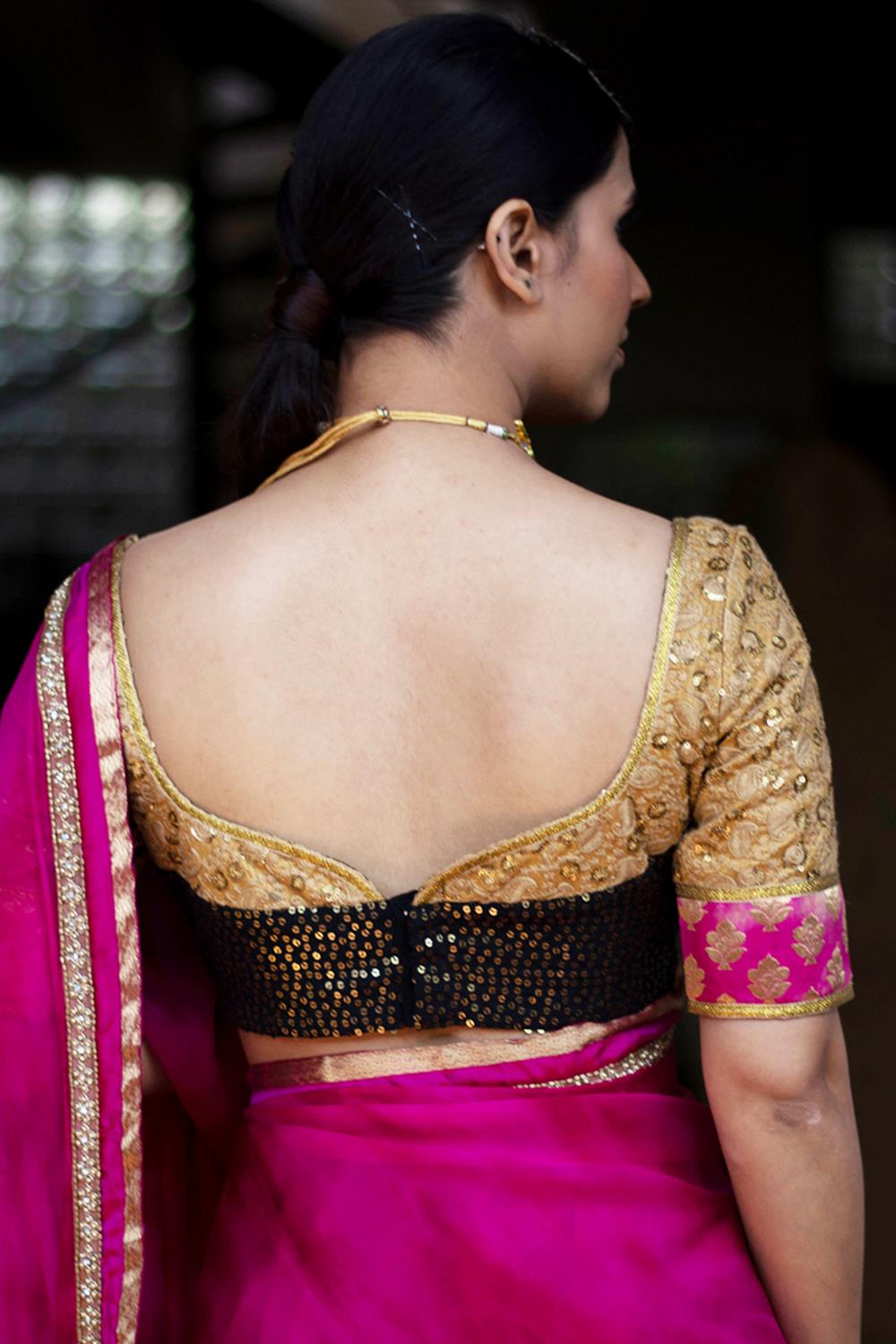 Patchwork blouse made in pink and black brocade with embroidered cotton sleeves - House of Blouse