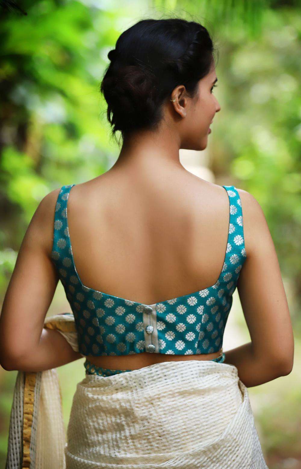 Sea green brocade sleeveless blouse with silver motifs - House of Blouse