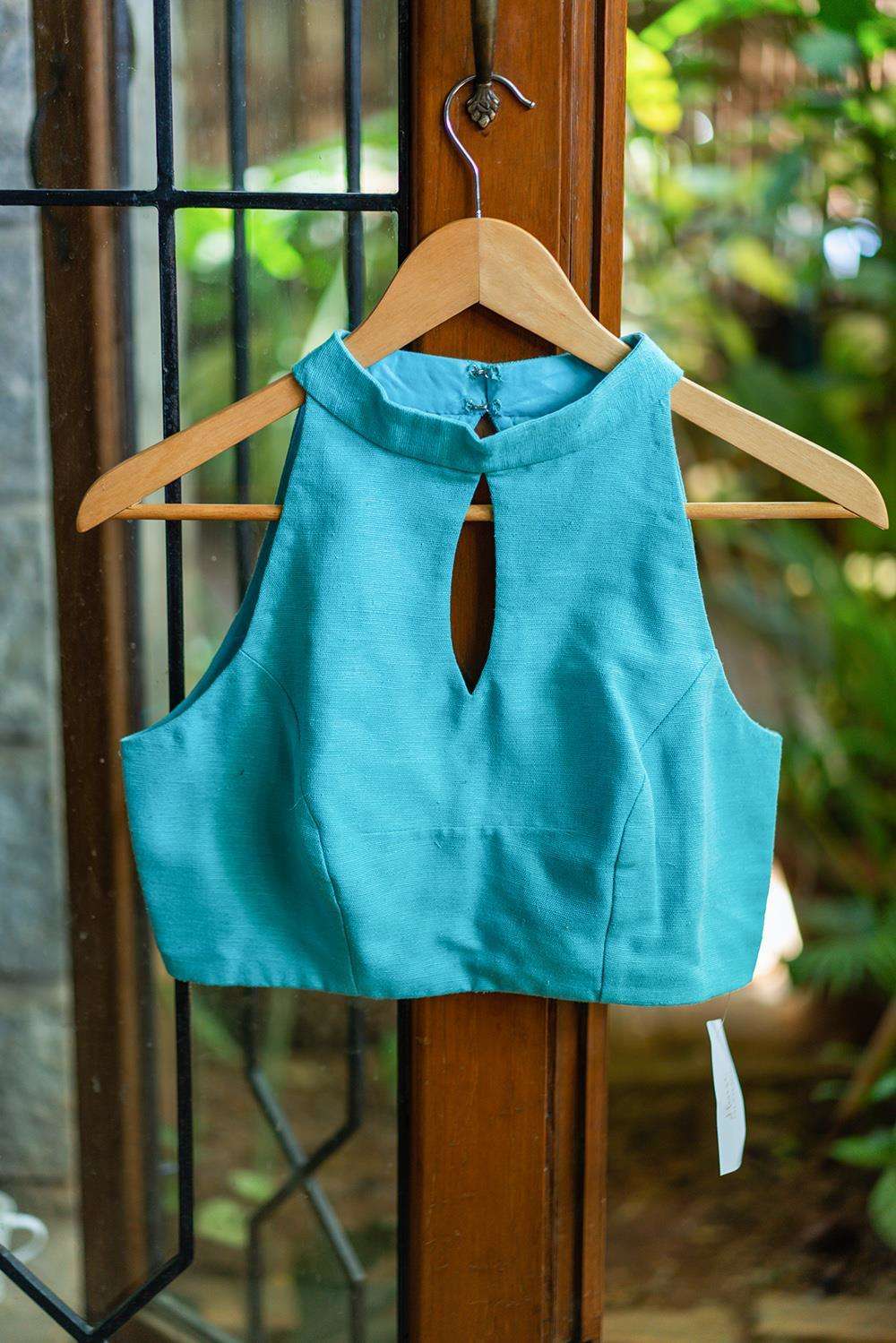 Turquoise jute cotton hi neck sleeveless blouse - House of Blouse
