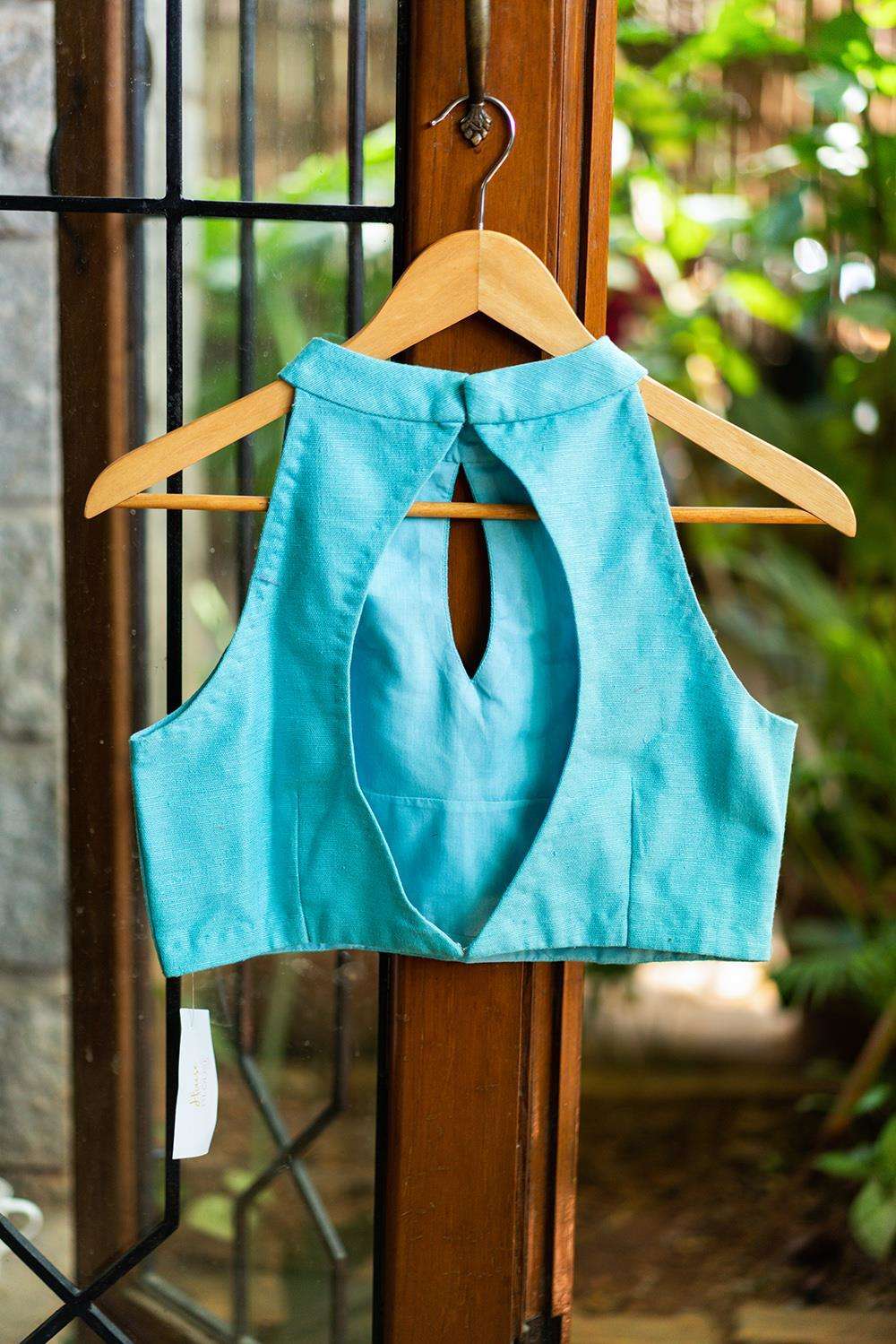 Turquoise jute cotton hi neck sleeveless blouse - House of Blouse