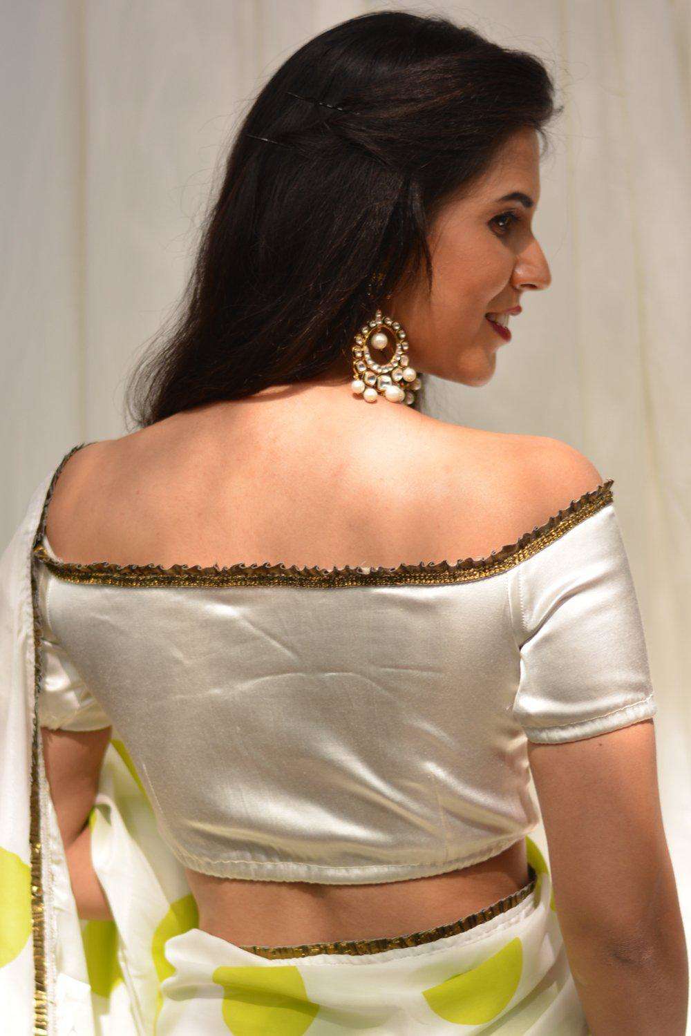 White stretch satin off-shoulder blouse with gold frill edging - House of Blouse