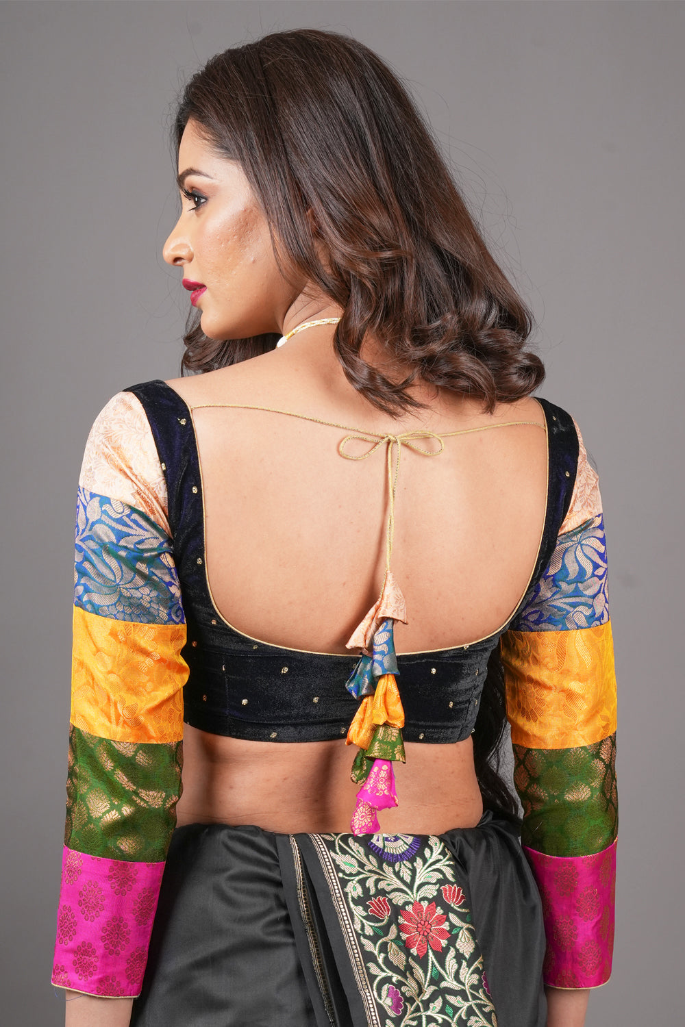 Midnight blue velvet blouse with rounded square neck and pure kanjivaram silk brocade  sleeves.