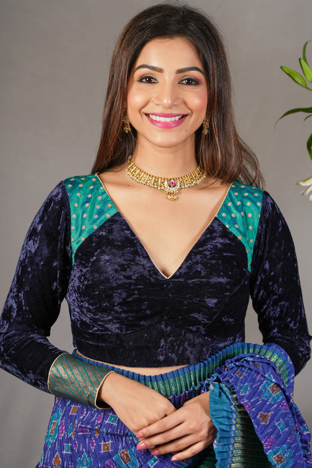 Navy blue crushed velvet V neck blouse with raw silk and brocade detailing