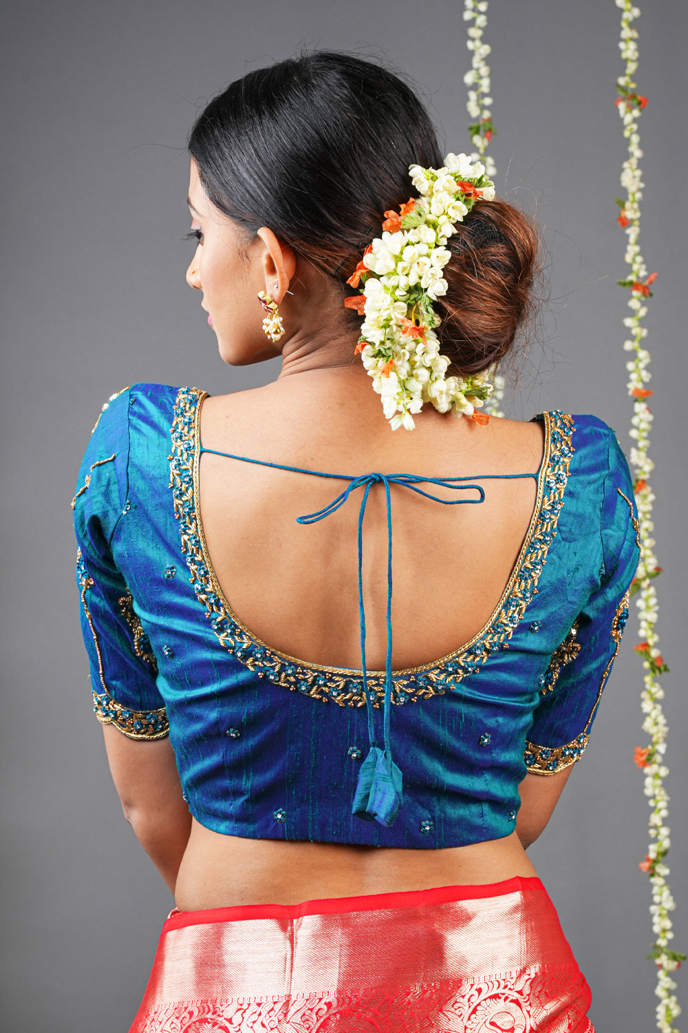 Peacock blue pure raw silk U neck blouse with zardozi and bead detailing