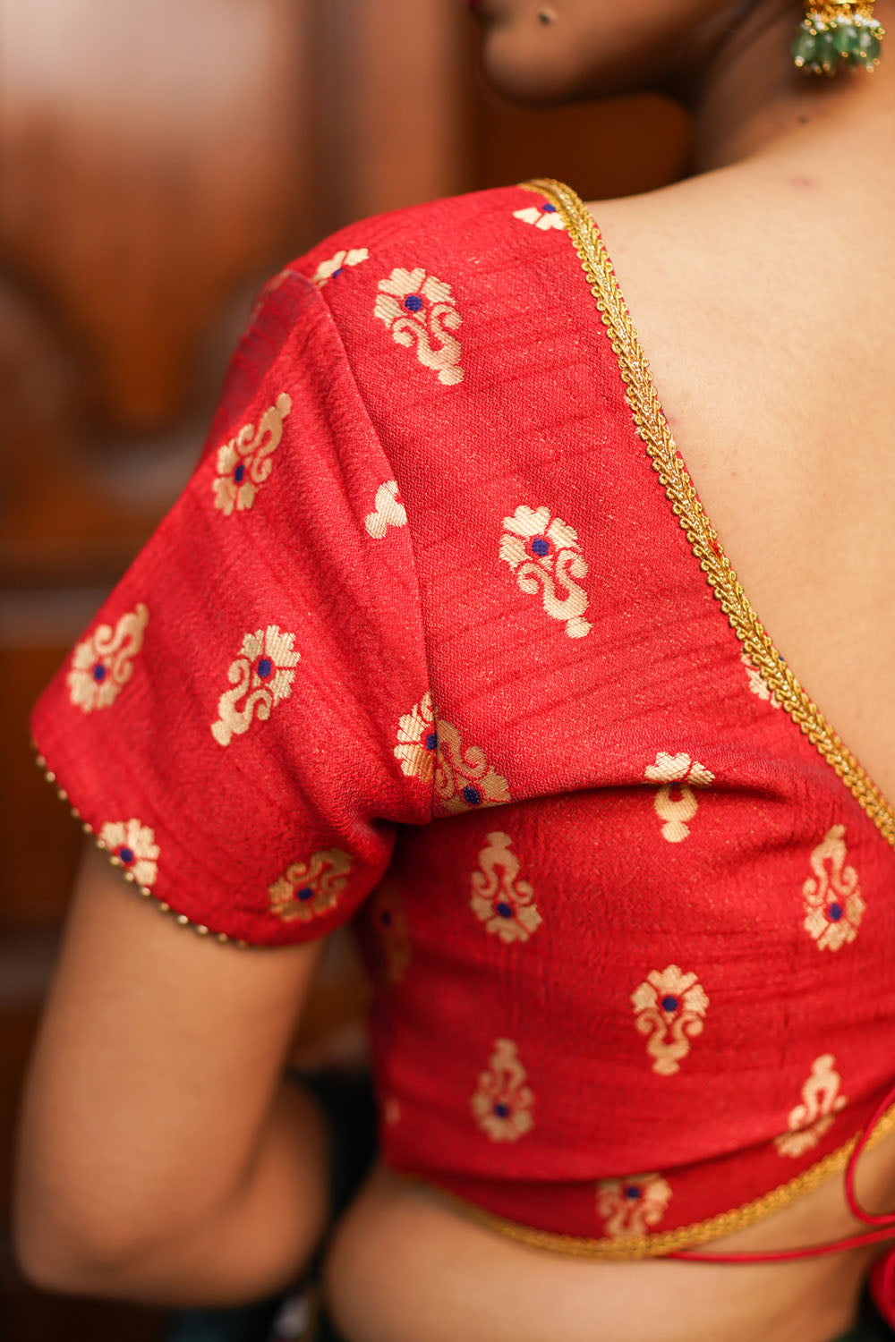 Red brocade with gold motif  deep V neck blouse
