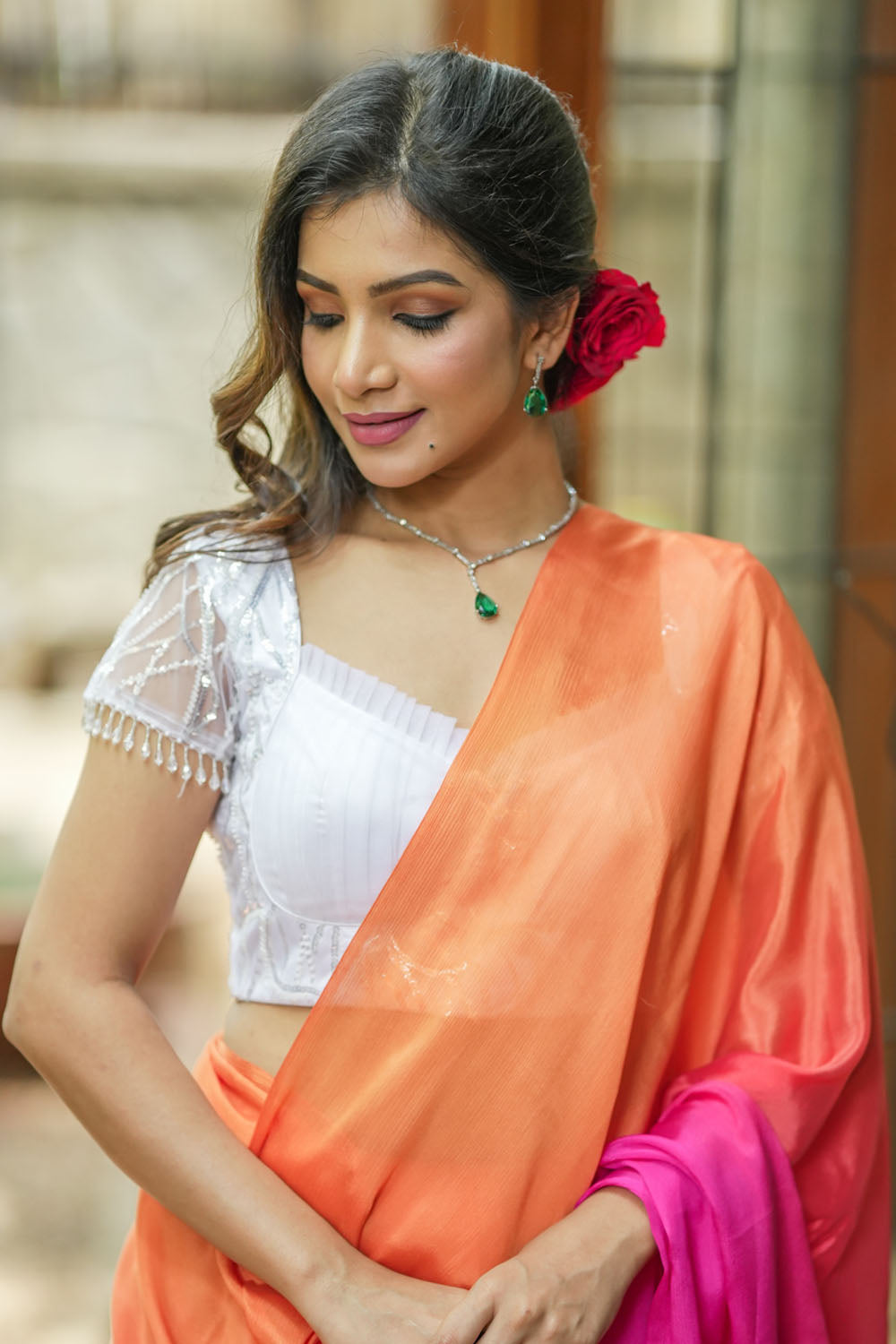 White sequin sweetheart neck blouse with  net frills detailing.