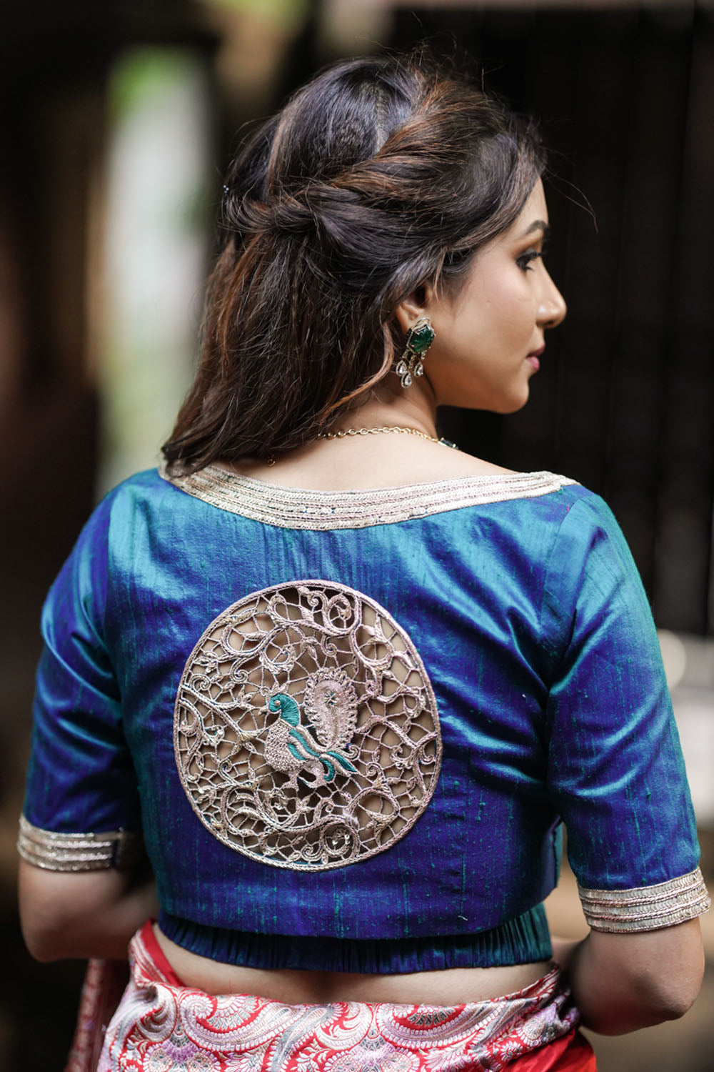 Azure blue pure raw silk rounded U neck blouse with cutwork detailing and matching belt.