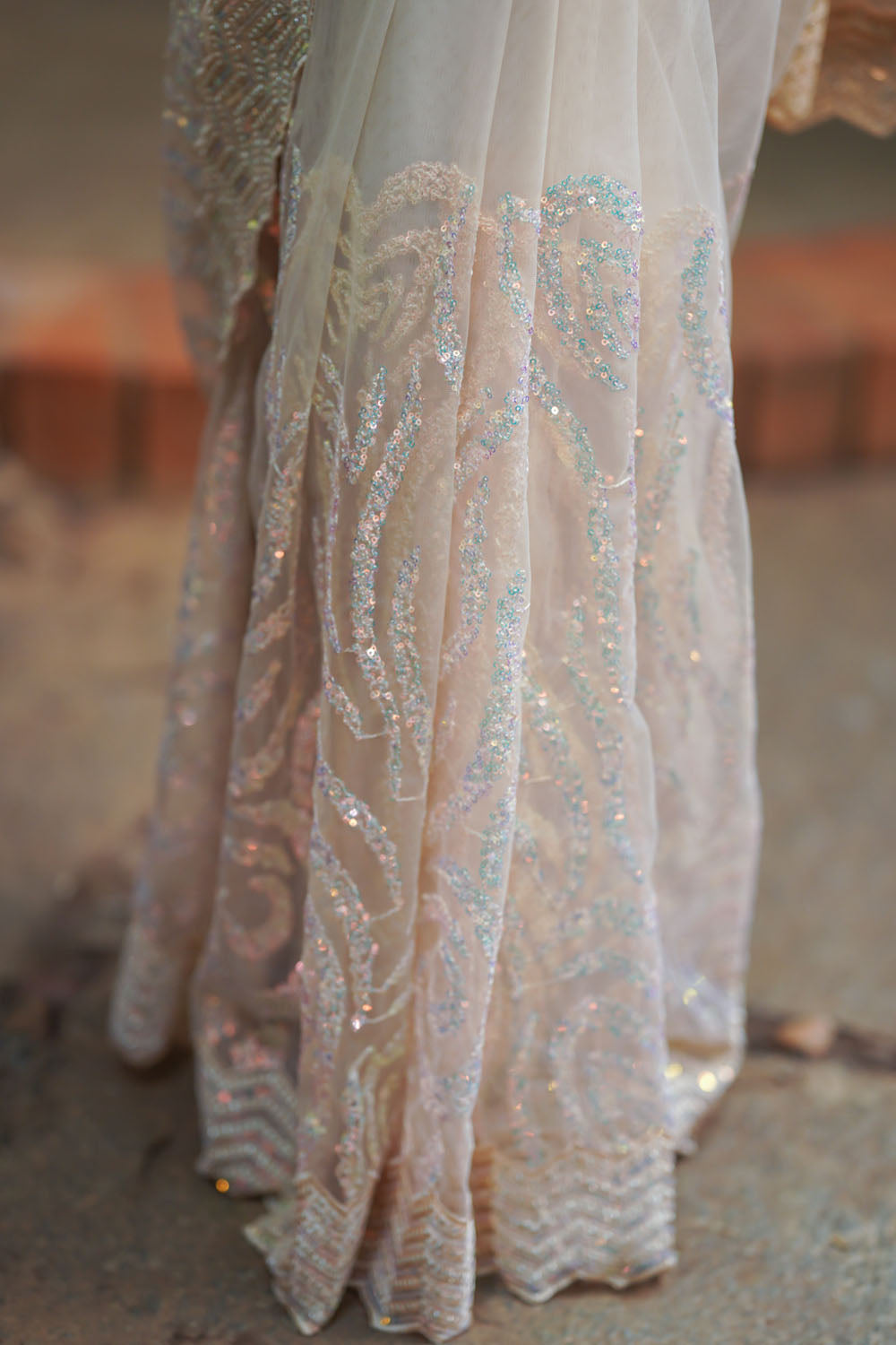 Champagne Color Sequin on Net Saree with Swirl design