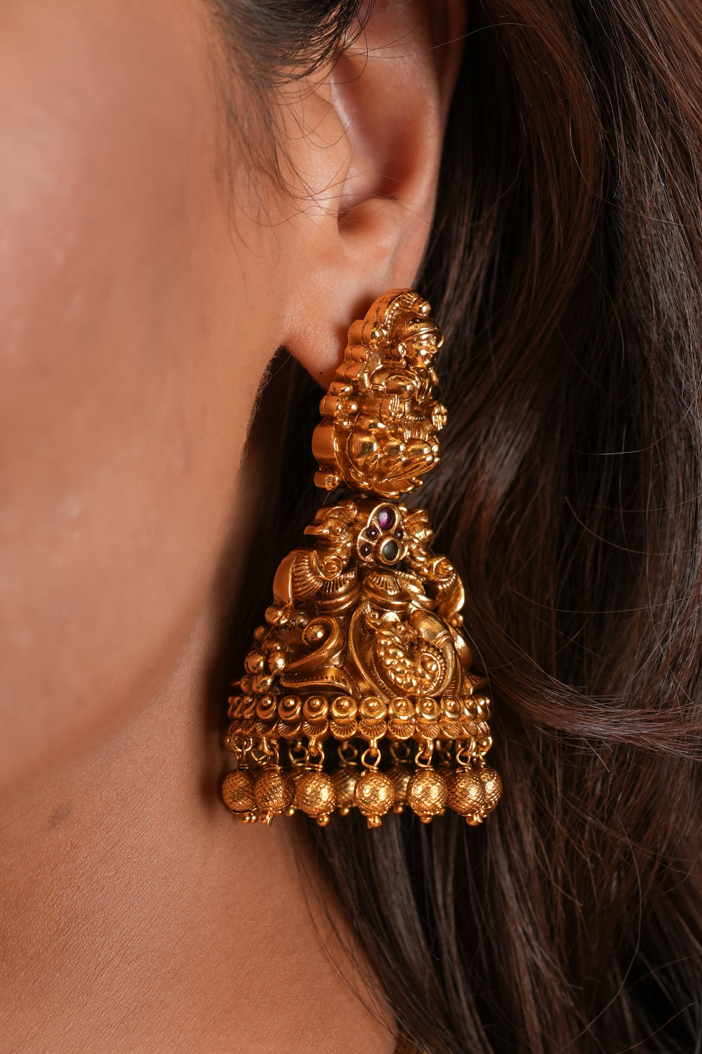 Antique Dark Gold Tone Lakshmi Design Prominent Jhumka earrings
