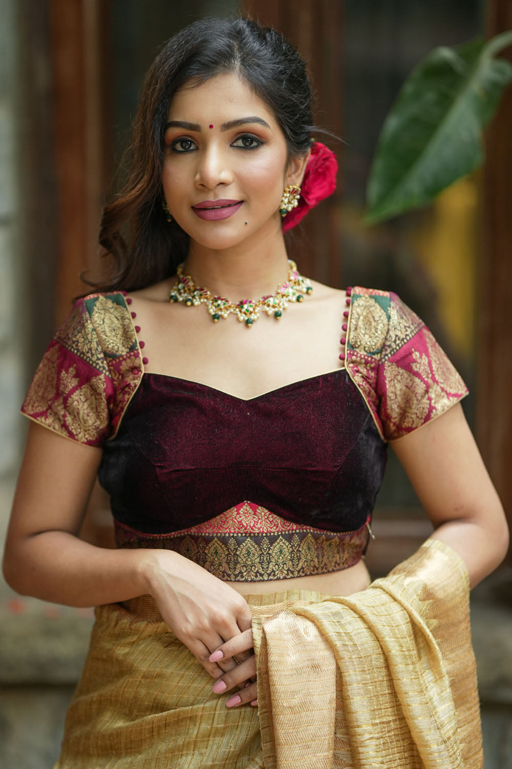 Burgundy velvet and banarasi brocade sweetheart neck blouse with potli button detailing