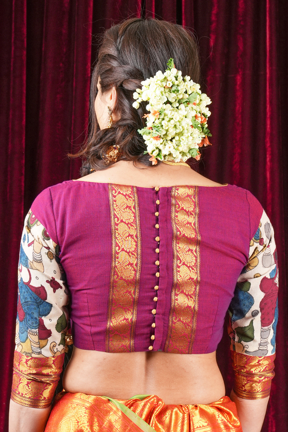 Plum narayanpet cotton boatneck blouse with 3/4th kalamkari sleeves and zari patch.