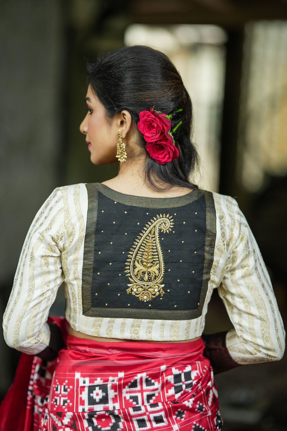 Ivory brocade round neck two fabric full sleeve blouse with paisley zardosi hand embroidered patch.