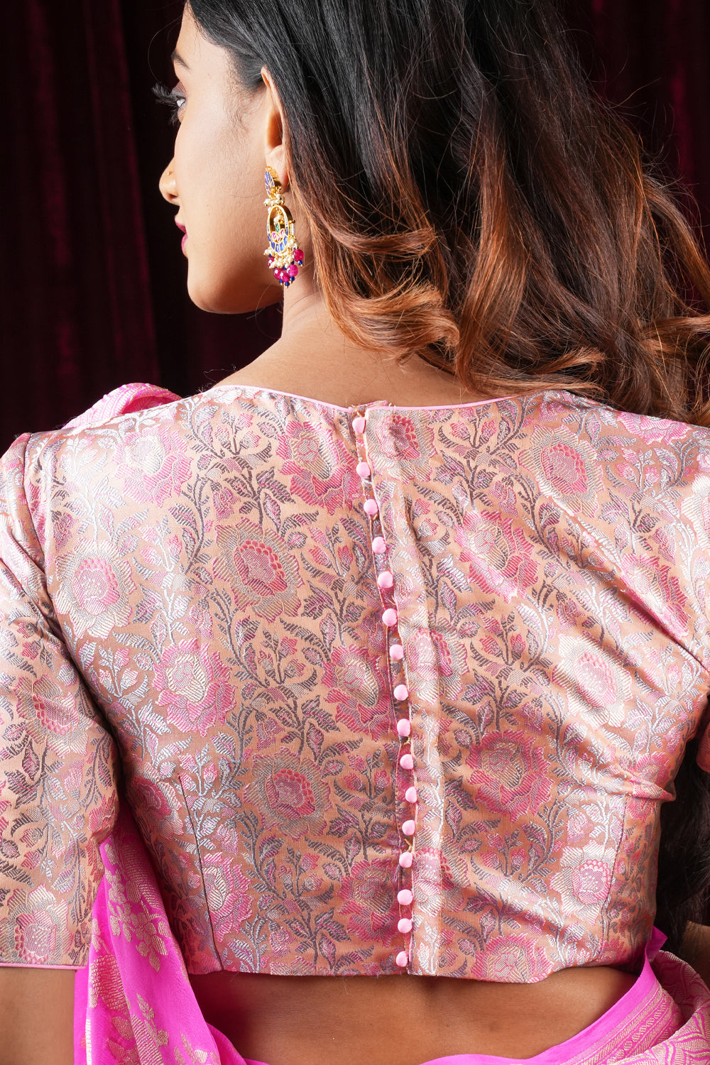 Pastel pink close neck short sleeves blouse in banarasi tanchoi floral weave fabric.