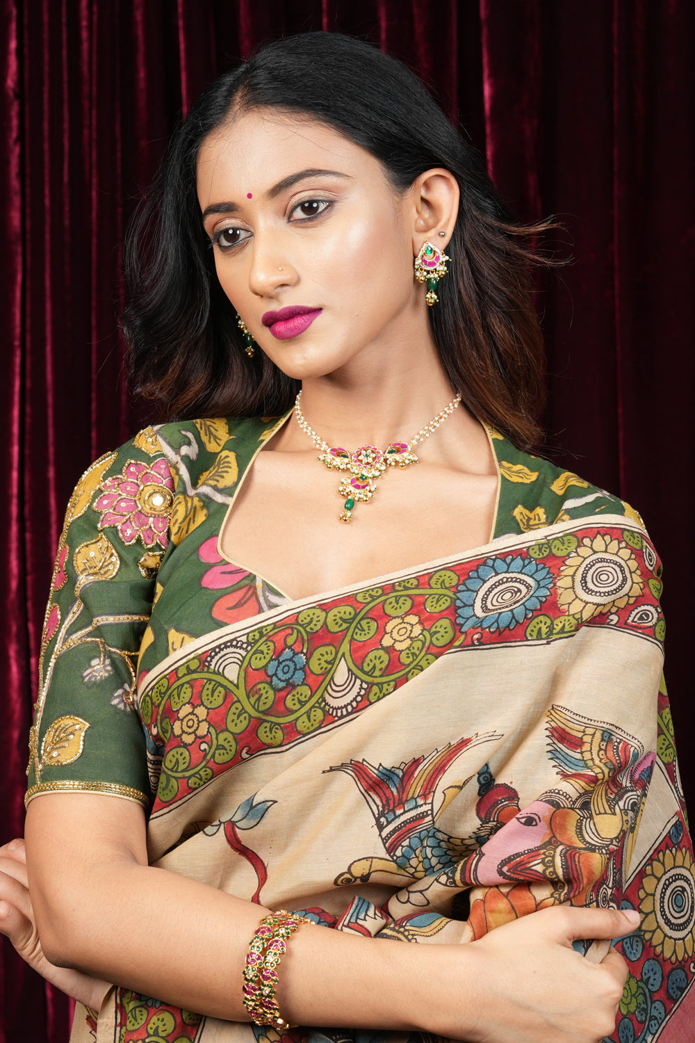 Pure Pen Kalamkari Blouse in olive green with peacock motifs and cutdana sequin hand work