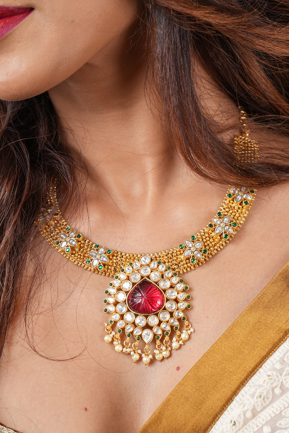 Gold Tone Necklace with Red and White stones
