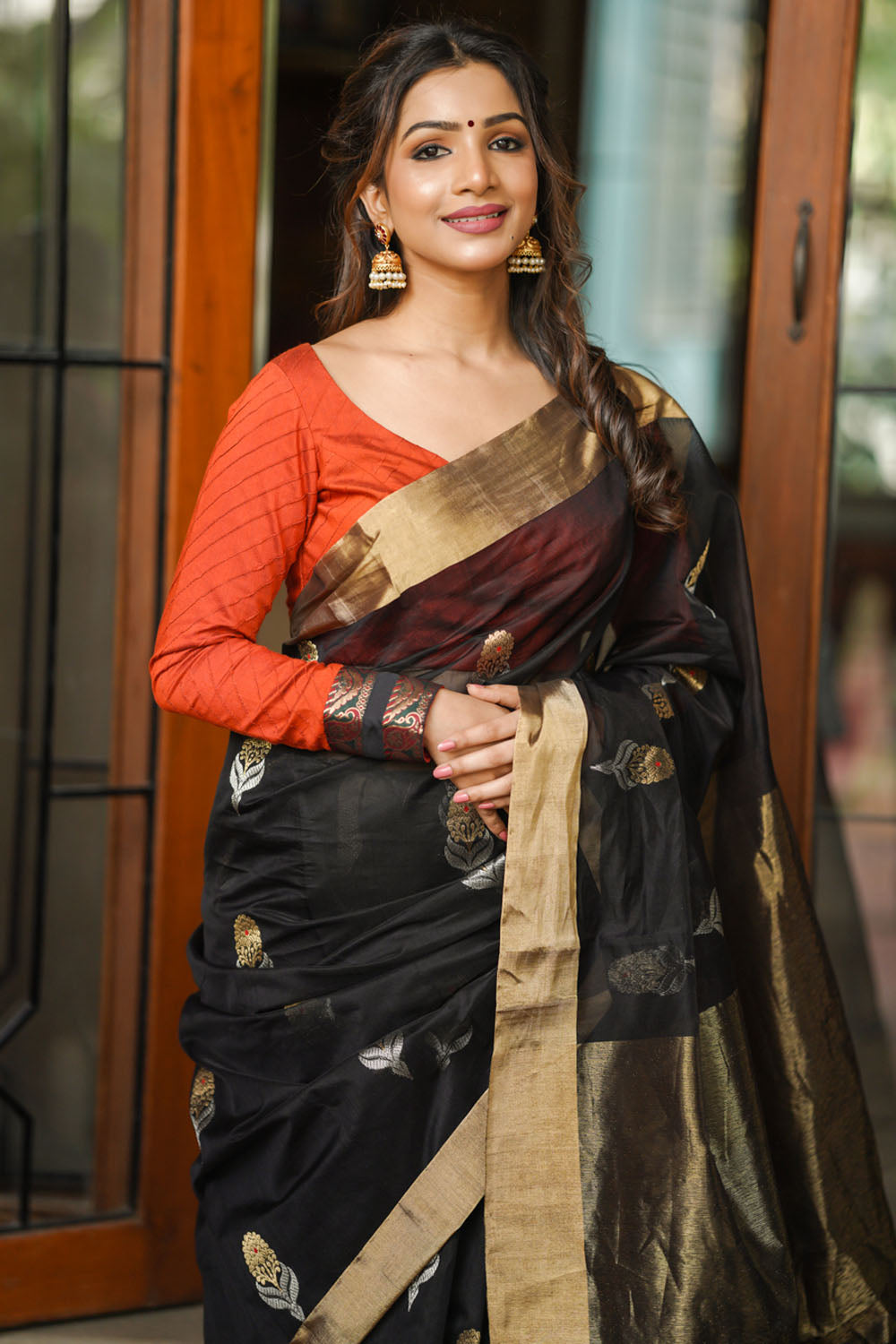 Black chanderi silk saree with floral motifs in silver and gold