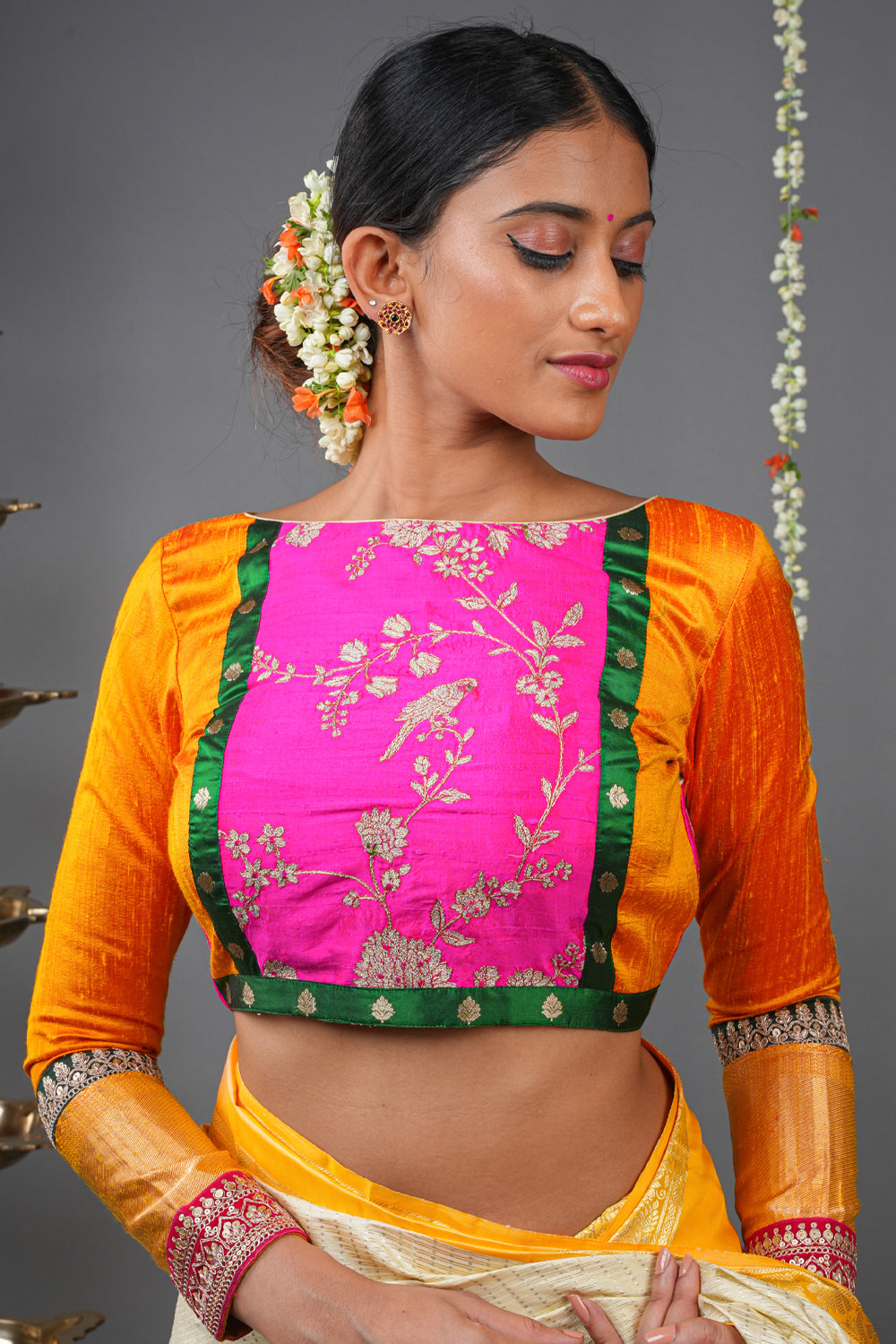 Pure raw silk 3/4 sleeve blouse with multicolour panels in rich hues.