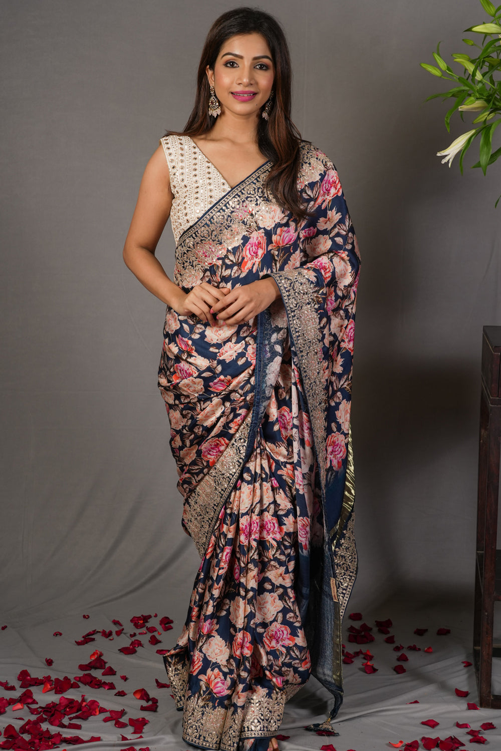 Navy blue gajji silk saree with floral print and crushed zari border