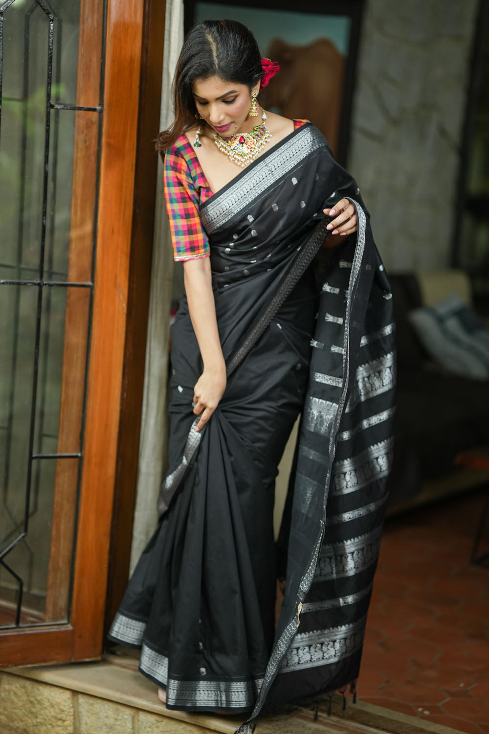 Black cotton silk with silver zari borders and buttas saree