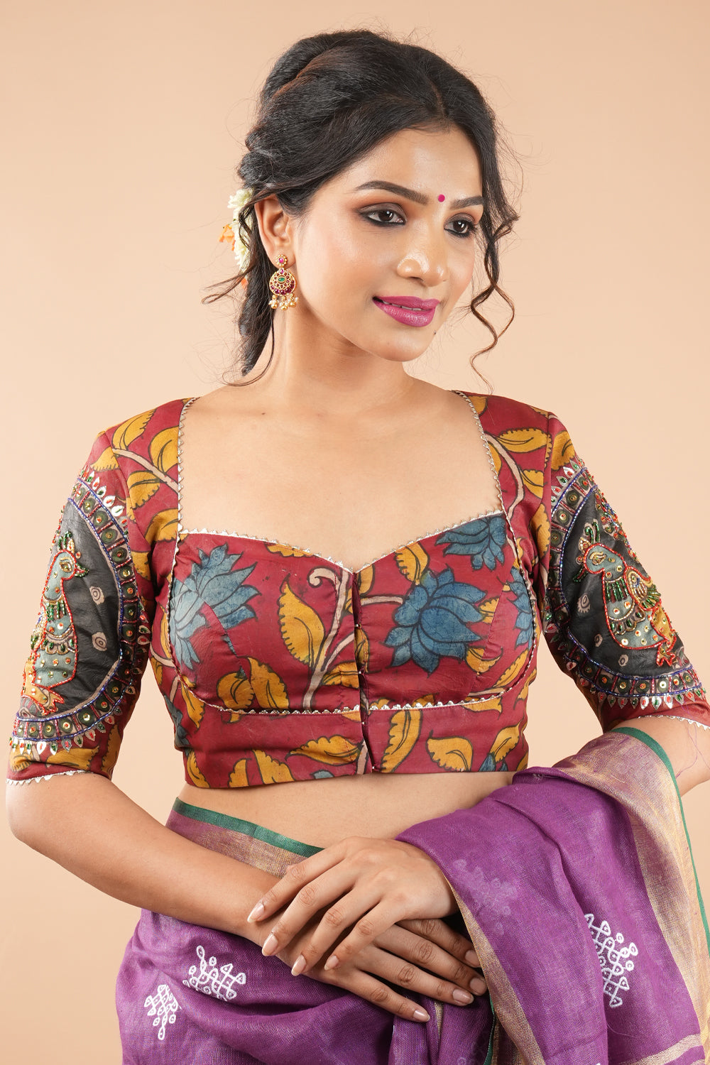 Red Kalamkari on silk blouse with sequin gotta and cutdana embelishments