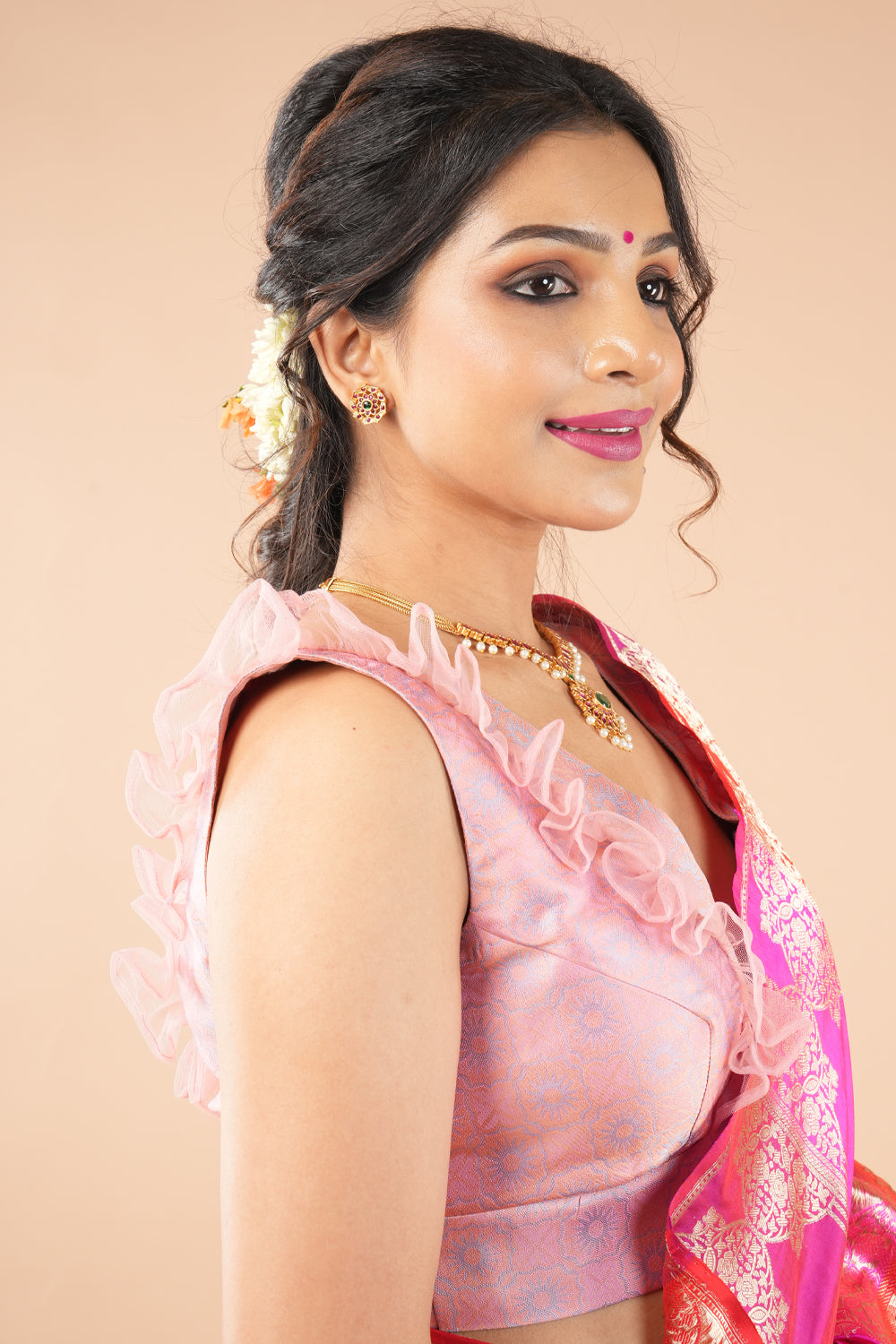 Pure kanjivaram meenakari silk brocade blouse in pastel pink with frill detailing