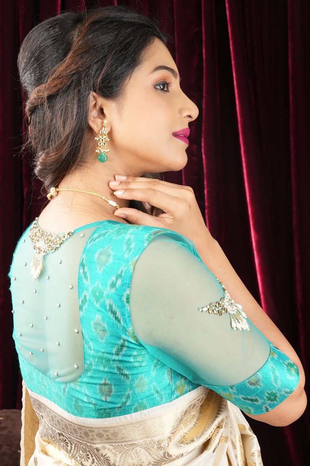 Cyan Pure ikkat Raw silk blouse with Rhinestone detailing in back and sleeves