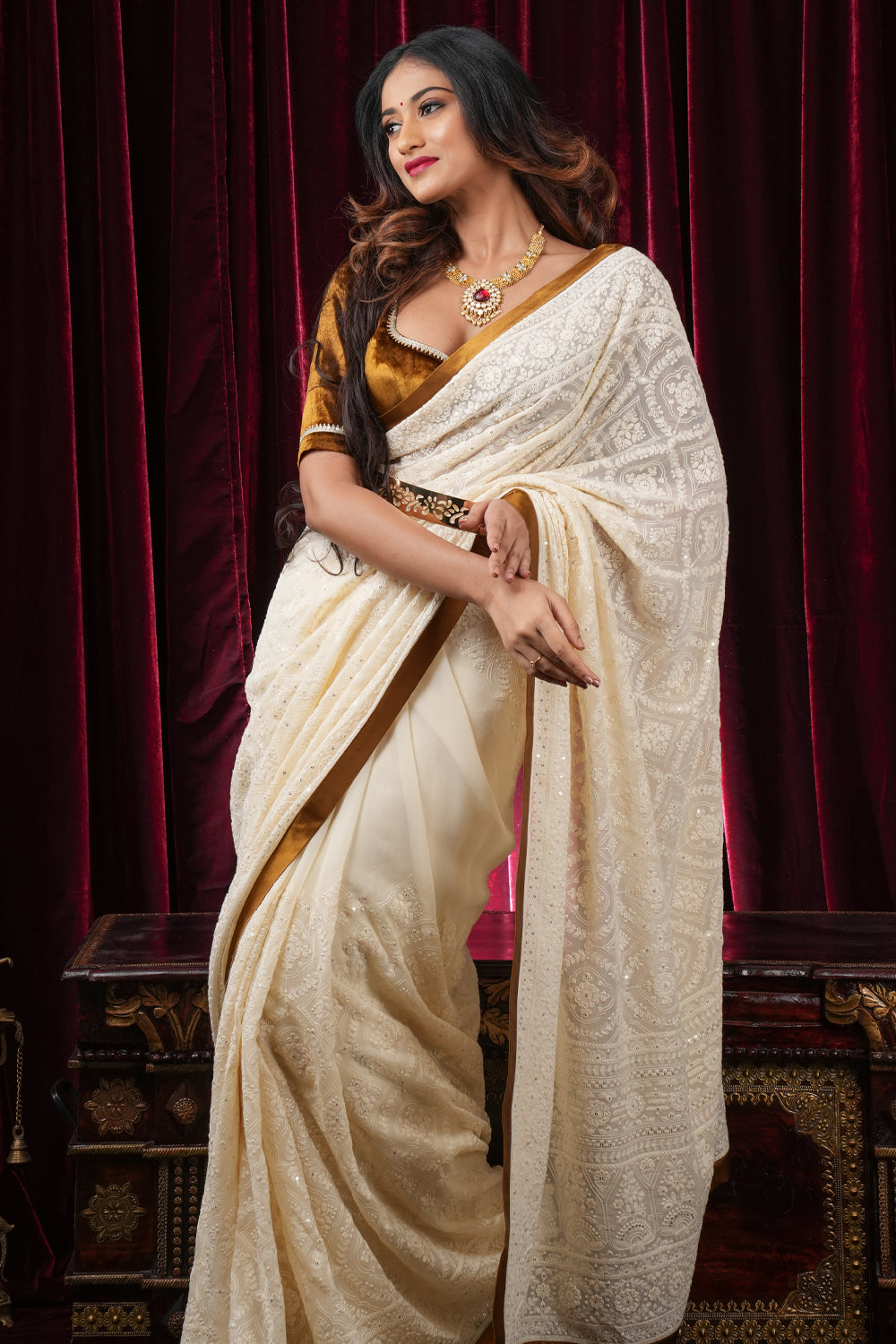 Ivory Georgette Saree with Self Embroidery and Amber Satin Trim