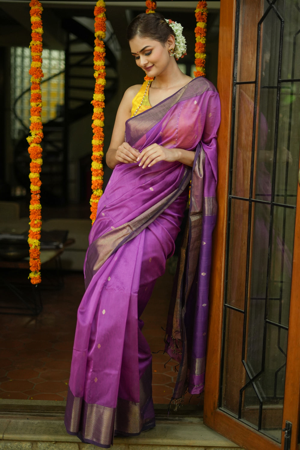 Purple maheshwari silk cotton saree with  muted gold border