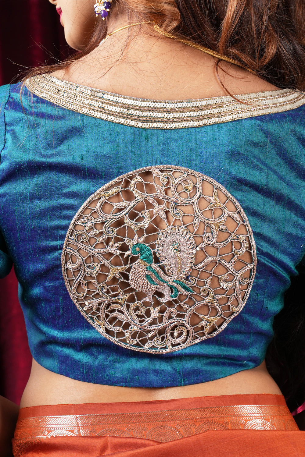 Peacock blue pure raw silk rounded square neck blouse with  zardosi cutwork.