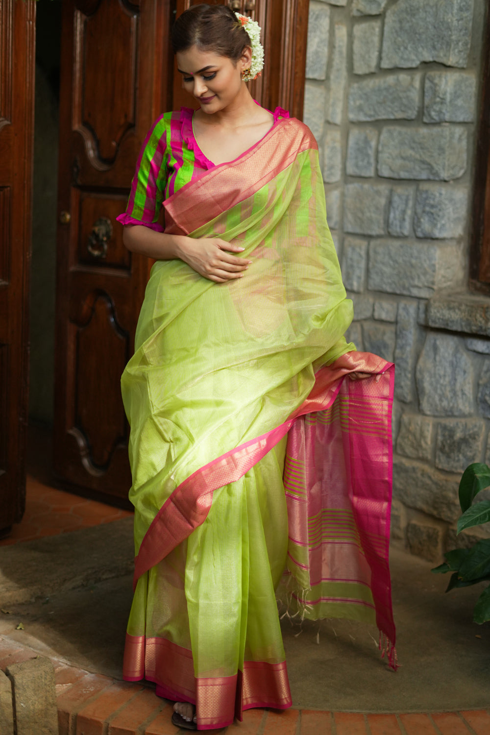 Pista green maheshwari silk cotton saree with  pink border