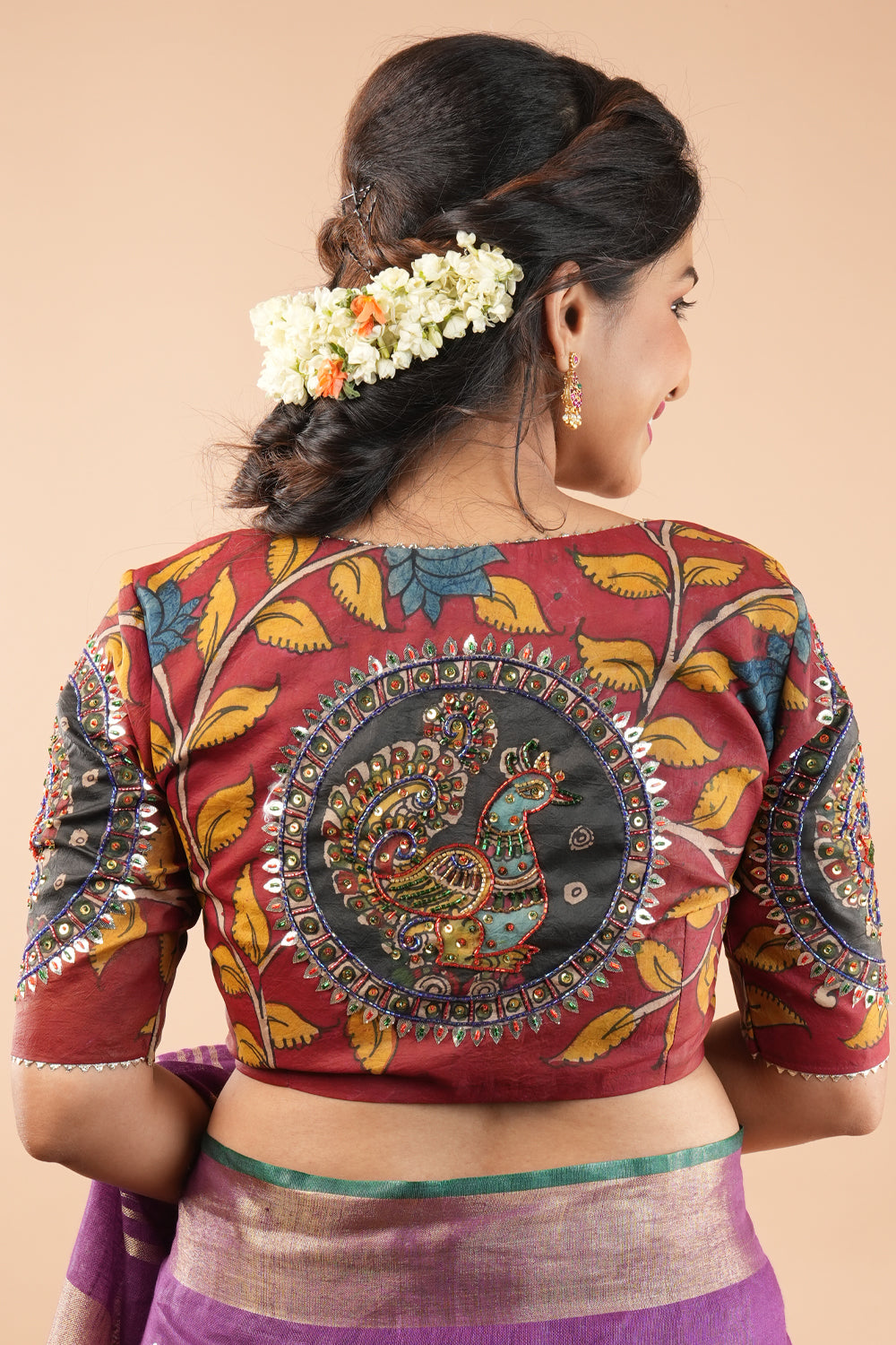 Red Kalamkari blouse with Cut dana and sequins hand embroidery work