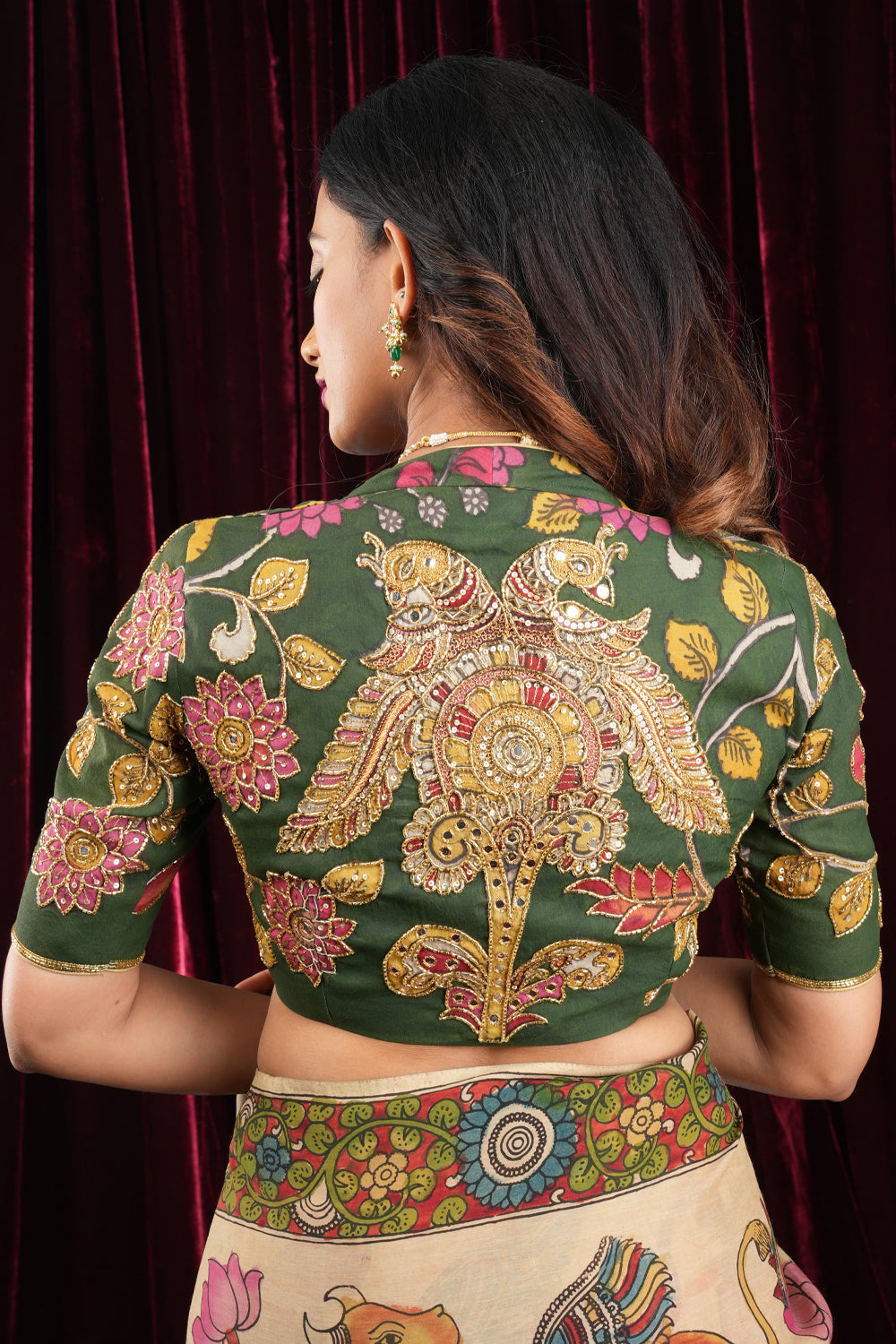 Pure Pen Kalamkari Blouse in olive green with peacock motifs and cutdana sequin hand work