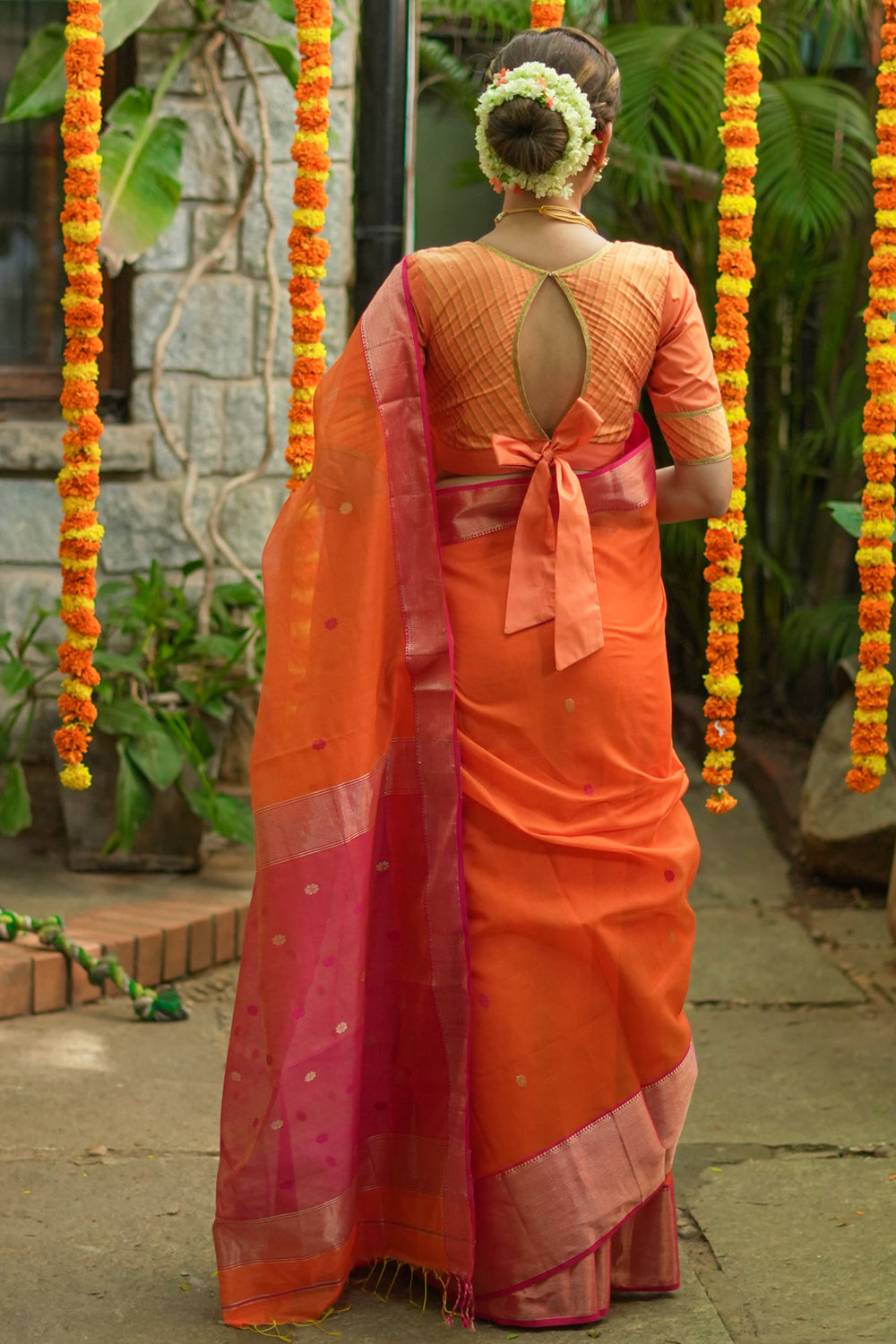 Orange  maheshwari silk cotton saree.