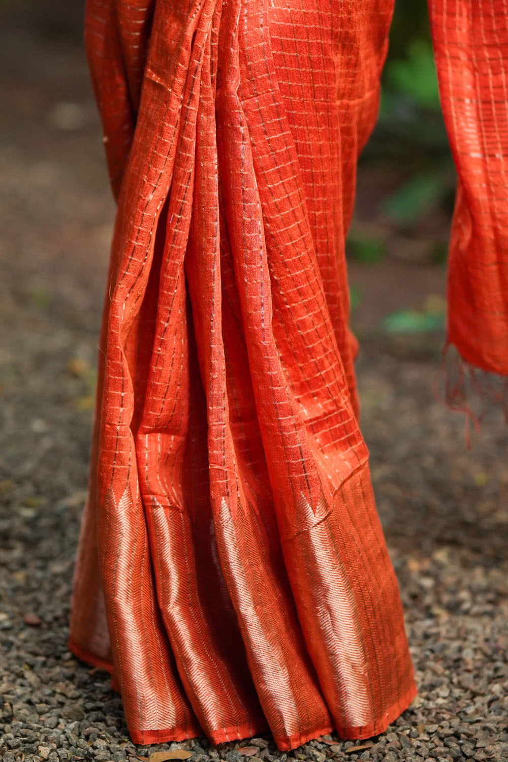 Orange matka silk with zari checks and wide zari temple border Saree