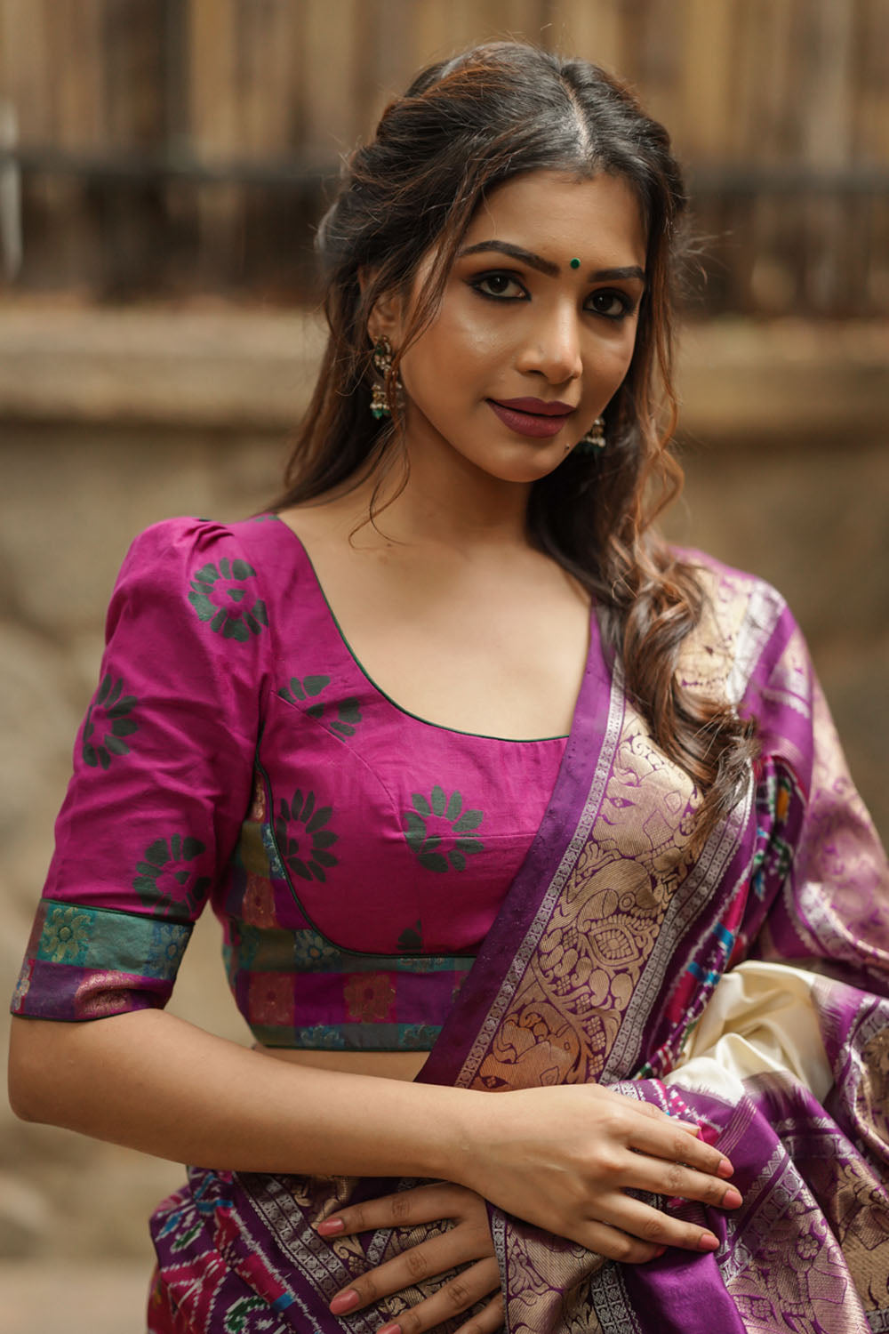 Dark magenta chanderi silk cotton with green embossed print U neck blouse with multicolour brocade band