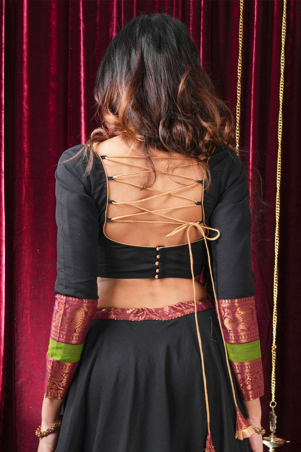 Black kanchi cotton sweetheart neck  full sleeves blouse with zari border.