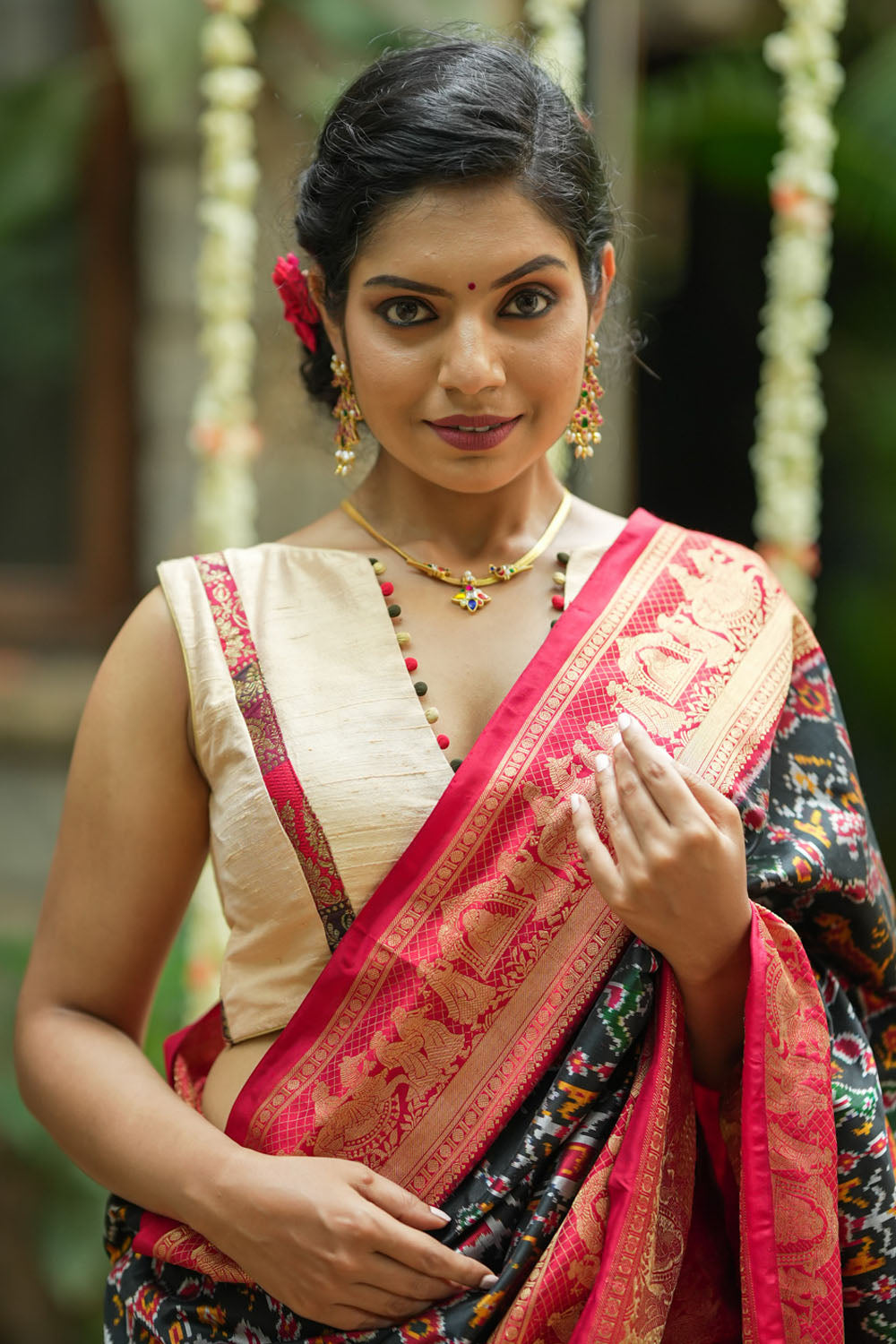 Ivory pure raw silk V neck sleeveless blouse with banarasi trim and potli button detailing