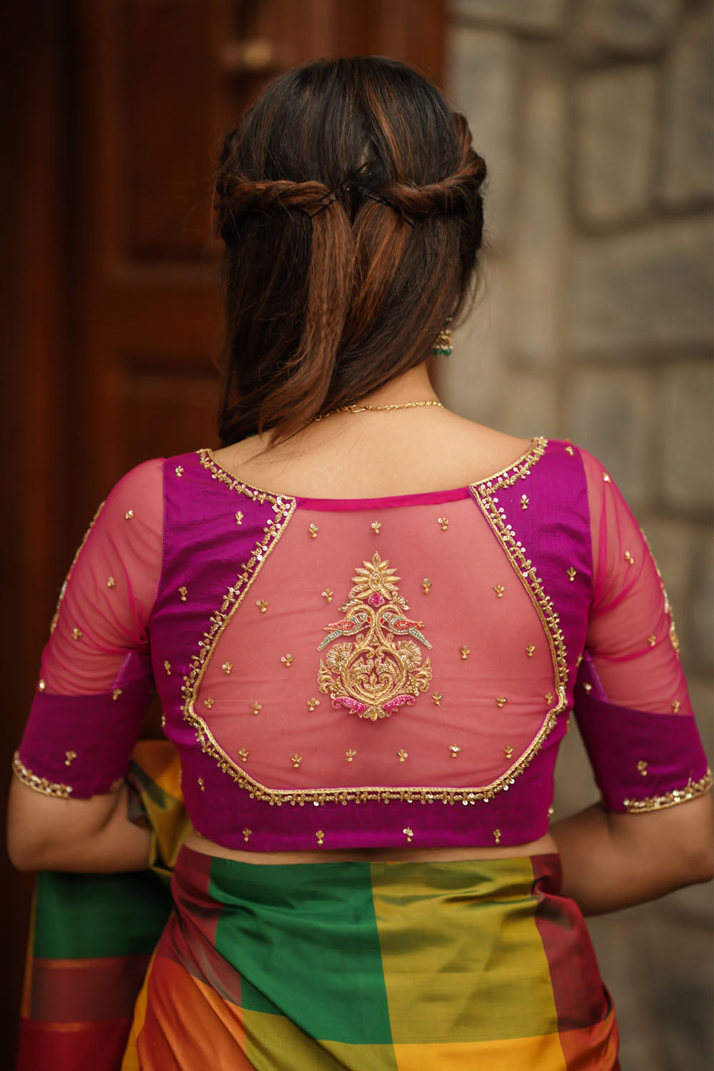 Magenta pure sIlk sweetheart neck blouse with zardosi work on net.