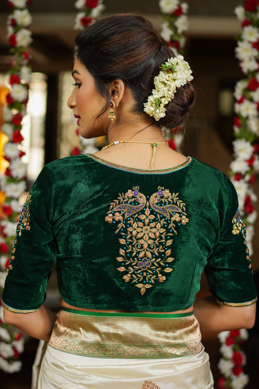 Green velvet sweetheart neck blouse with zardosi work