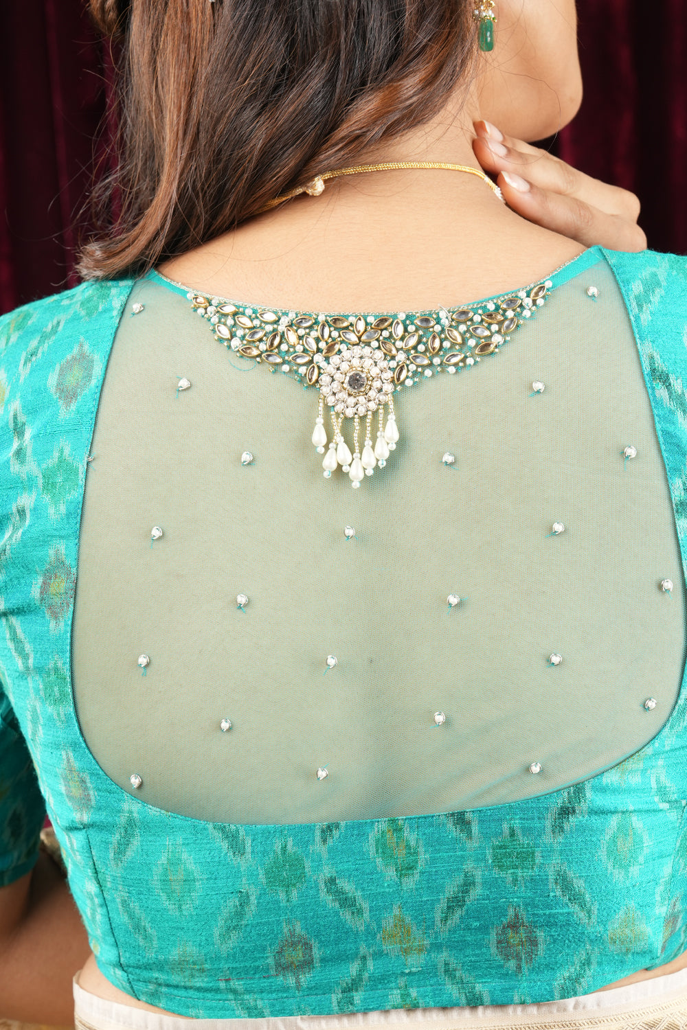 cyan pure ikkat rawsilk blouse with rhinestone detailing in back and sleeves
