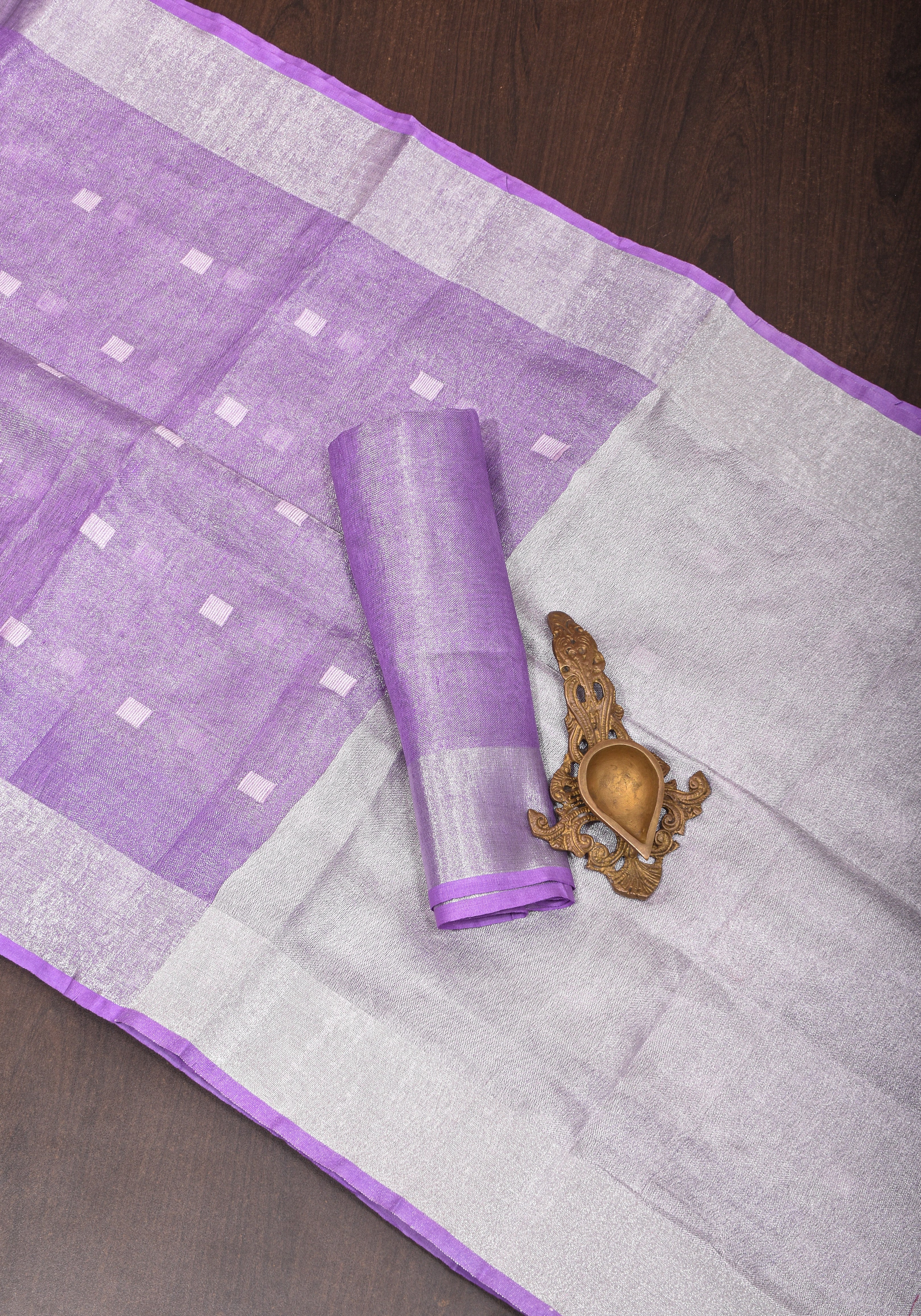 Lavender Hued Tissue Linen Saree with silver zari borders and long tassels!