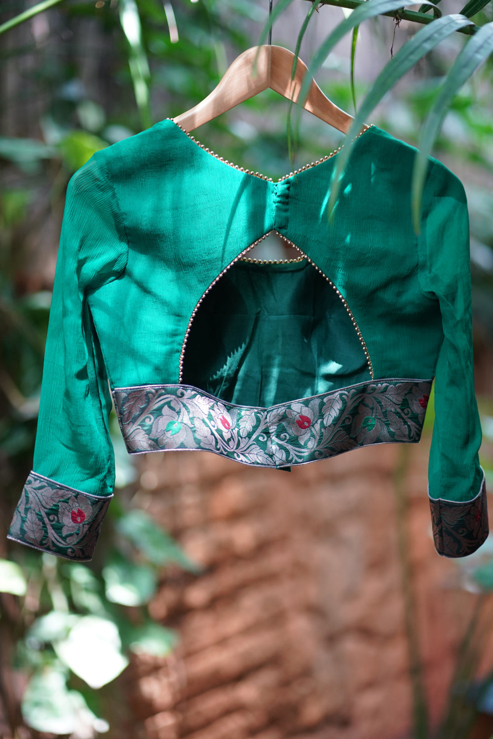 Green  chiffon blouse with brocade detailing and sheer sleeves