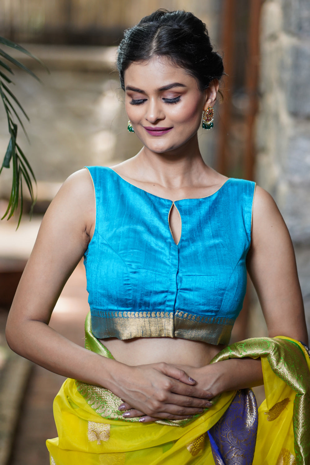 Copper Sulphate Blue Pure Raw Silk Sleeveless blouse with Wide Kanchi Border detailing in back