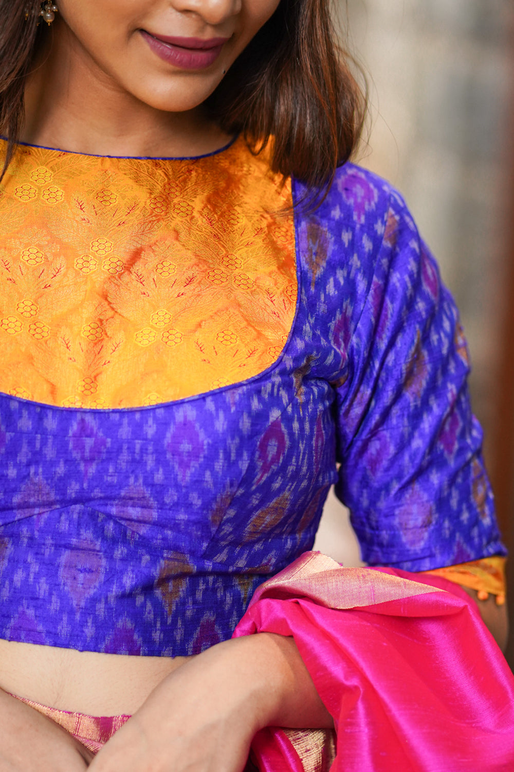 Pure handwoven ikkat on raw silk and kanjivaram silk brocade yoke on back cutout blouse with potli buttons