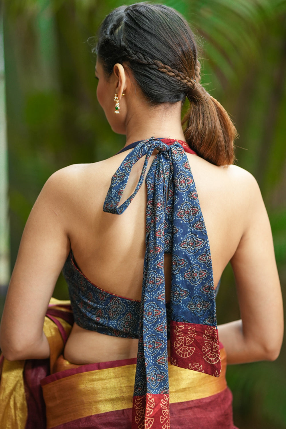Indigo ajrakh print halter neck blouse with maroon hand block print border